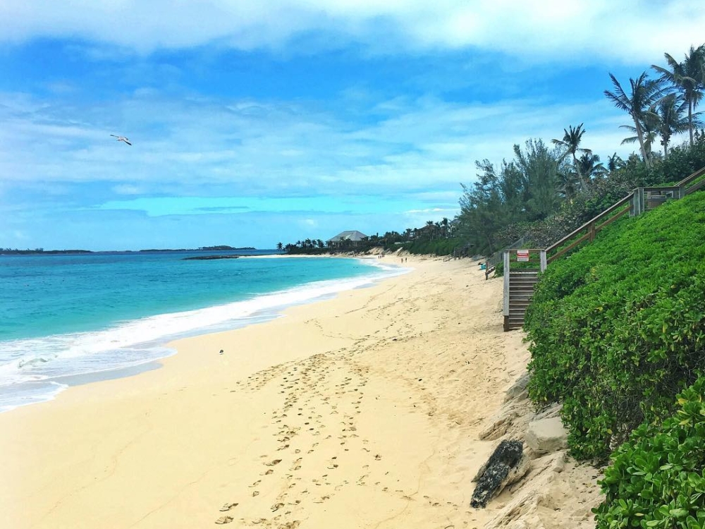 The white sand and turquoise water of Cabbage Beach in The Bahamas.