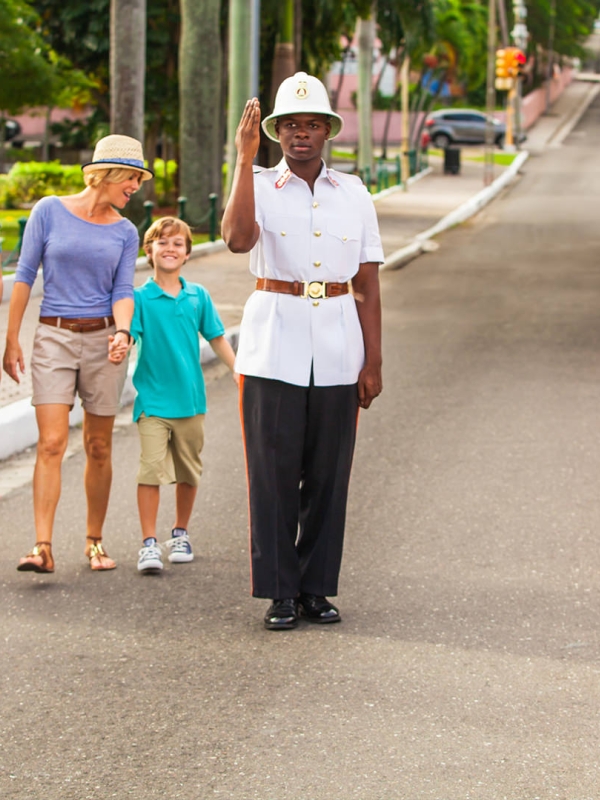 A friendly police officer gives a family directions.